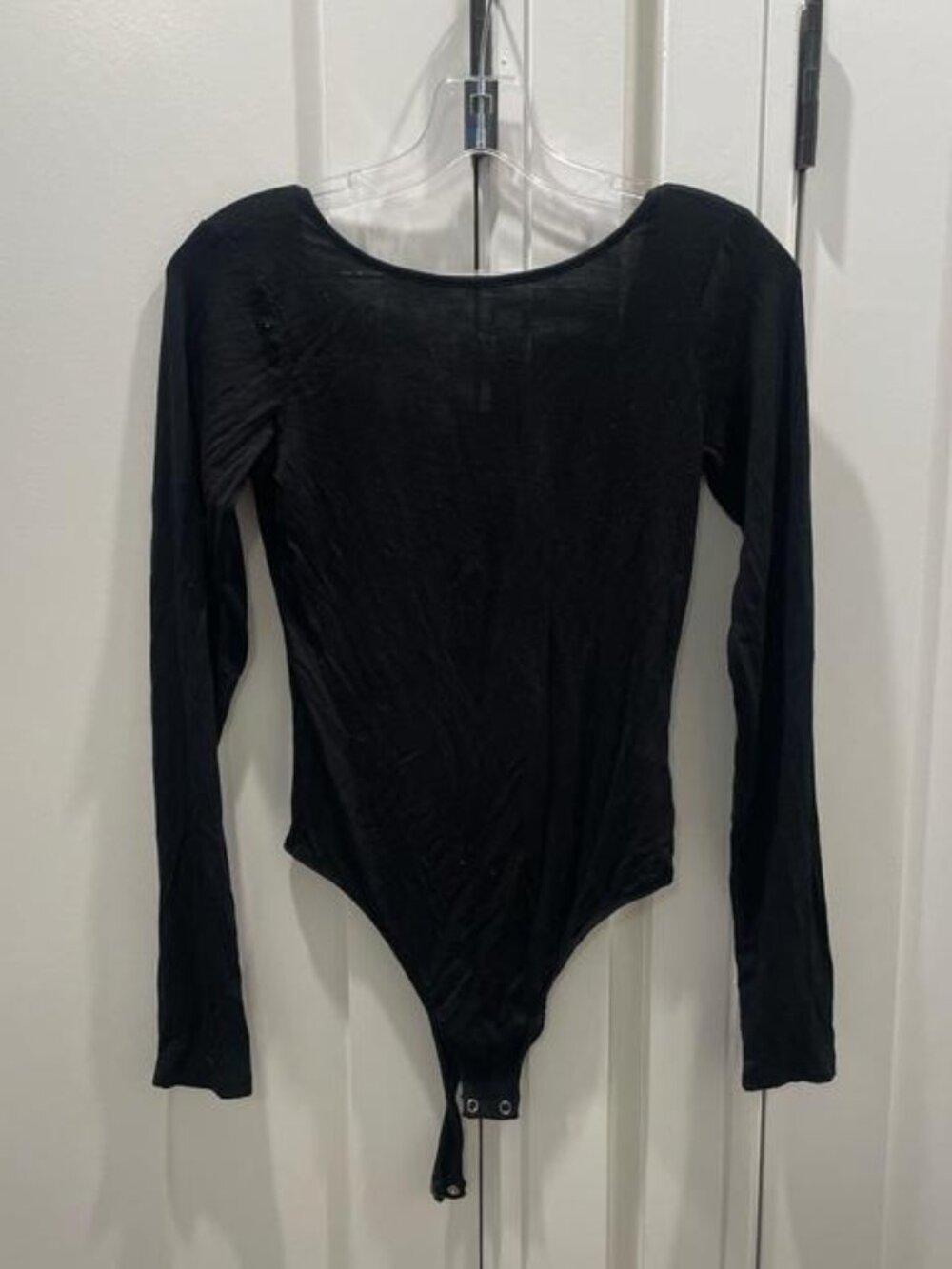 Black long sleeve bodysuit with low back
